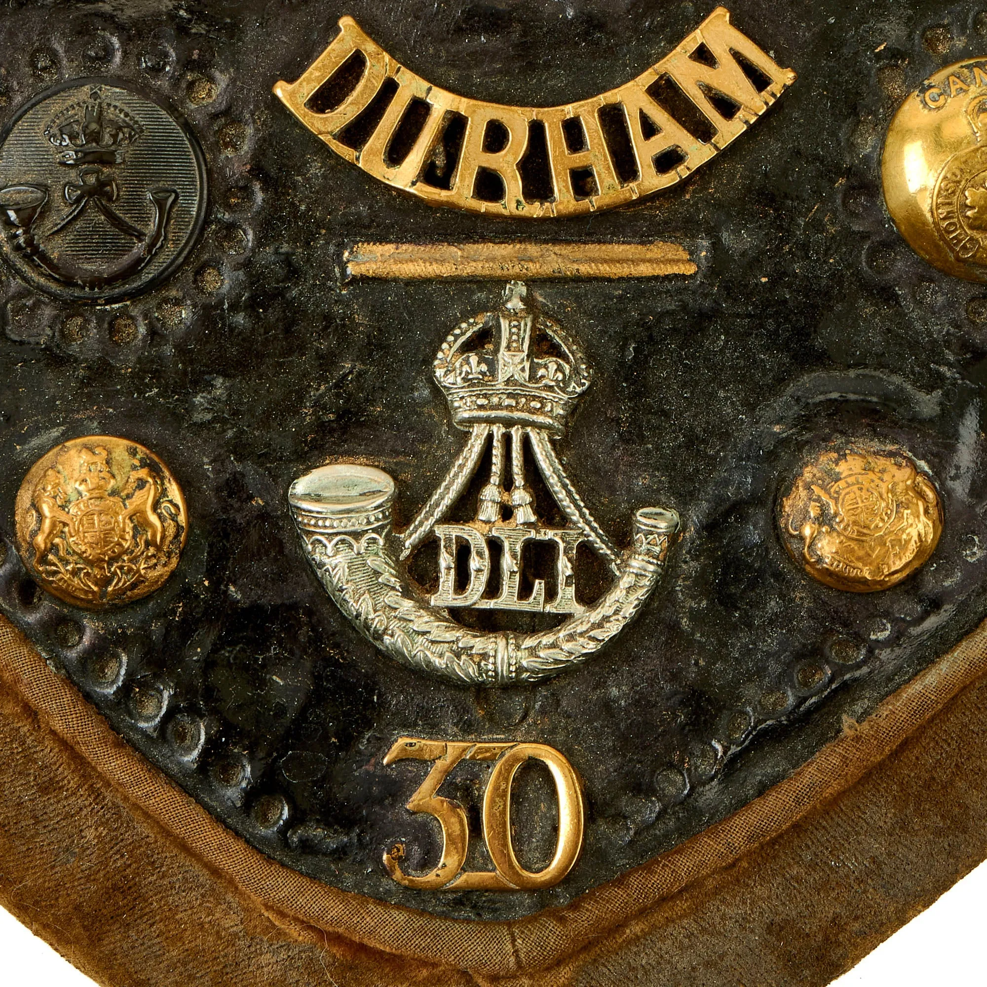 Original British WWI Era Heart Shaped Trench Art For The Durham Light Infantry With Buttons, Insignia and Imperial German Prussian Wappen Pickelhaube Plate